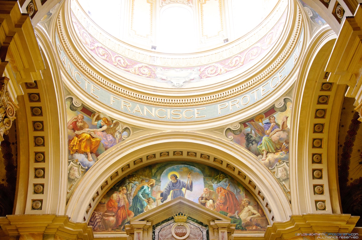 Church ceiling with paint and stone archs
