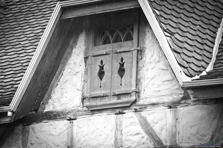 old german window´s house in the woods called Fachwerk or half-timbered style