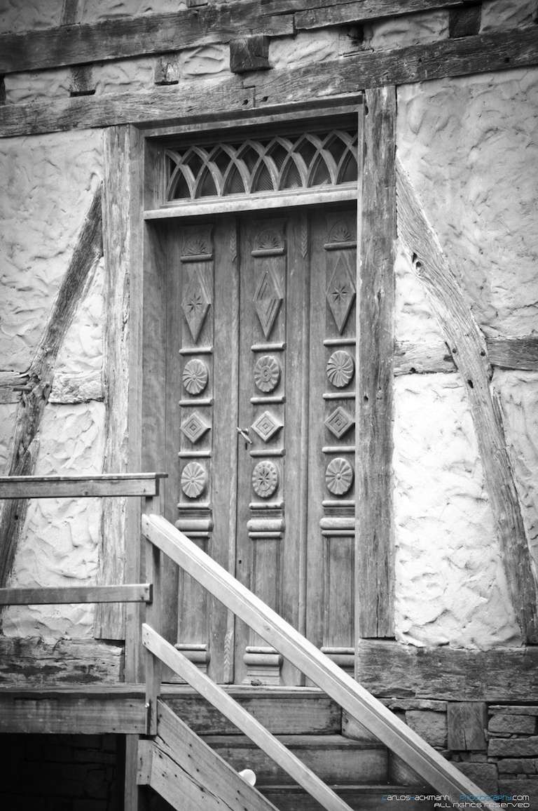 old german main door´s house in the woods called Fachwerk or half-timbered style