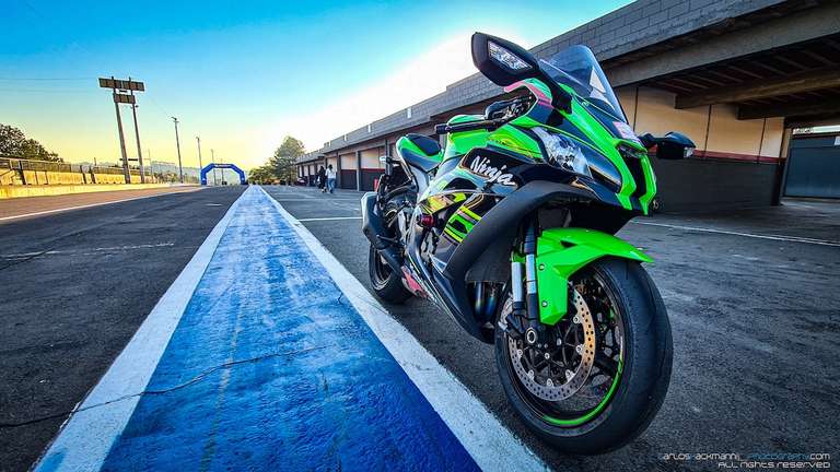 Motorcycle Kawasaki zx-10r in a race track pitlane