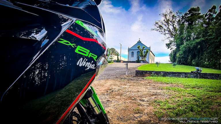 Motorcycle Kawasaki Zx-6r near a old church